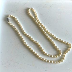 Appraised Akoya cultured pearls 36”excellent condition white gold/sapphire clasp